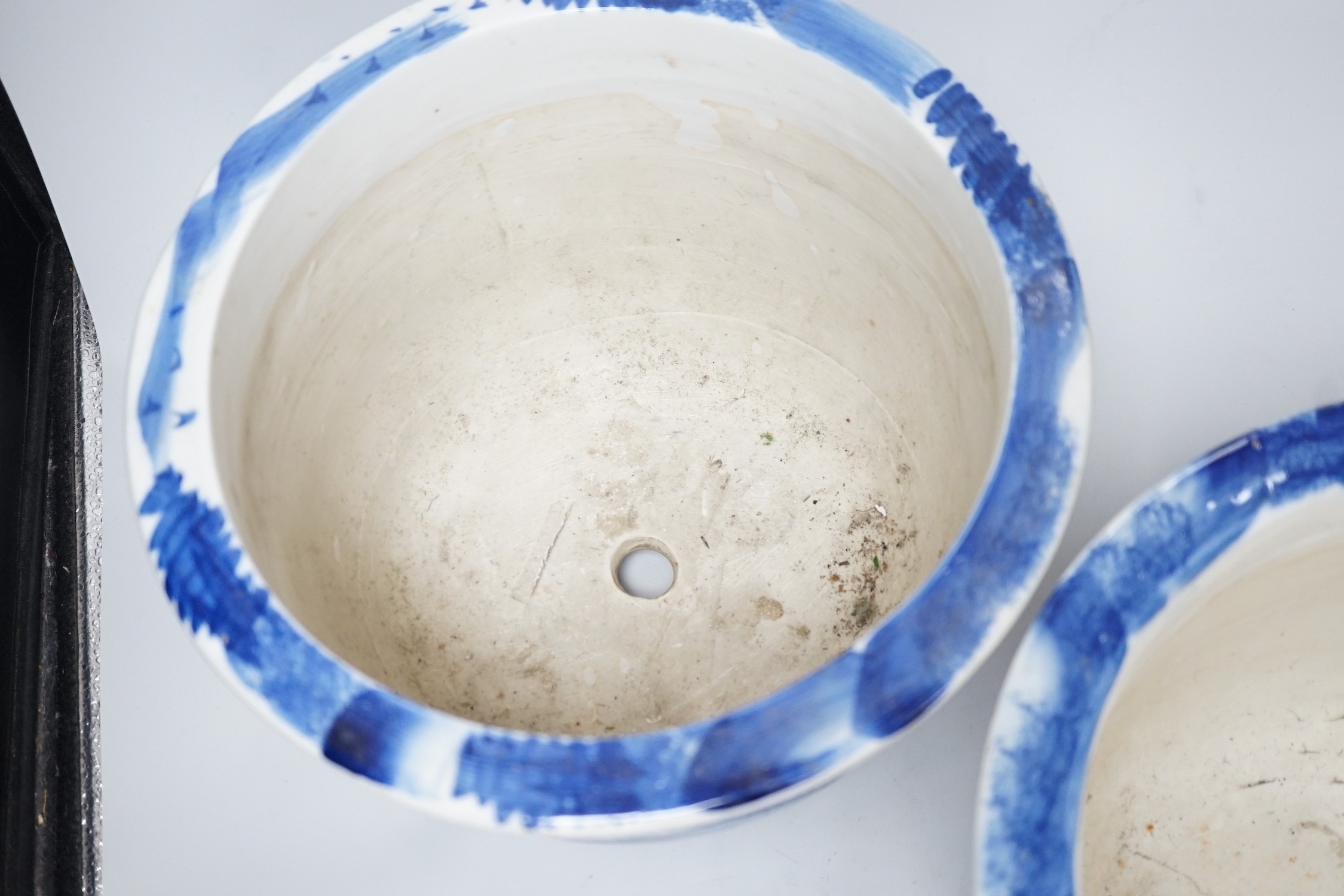 A pair of Japanese blue and white jardinieres, 31cm diameter